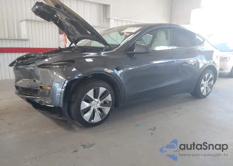 2023 Tesla Model Y Awd/Long Range Dual Motor All-Wheel Drive z USA, uszkodzony, nr VIN 7SAYGDEE4PF799452